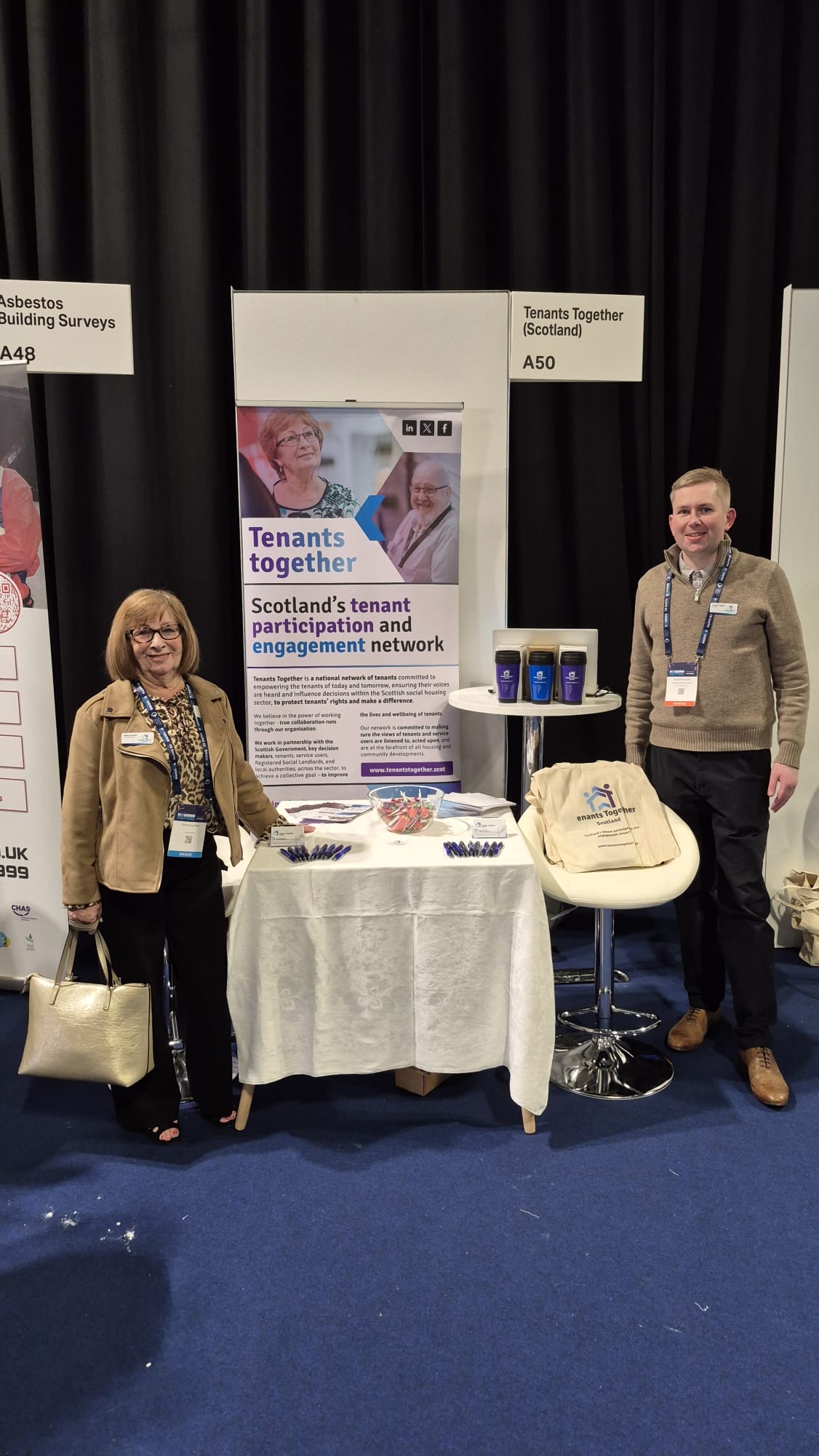 Left Shona Gorman, Right Scott MacLeod Stood at the Tenants Together Scotland in the Scottish Housing Festival